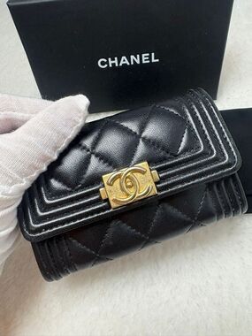 CHANEL Black Quilted Leather Mini Wallet with Gold CC Lock